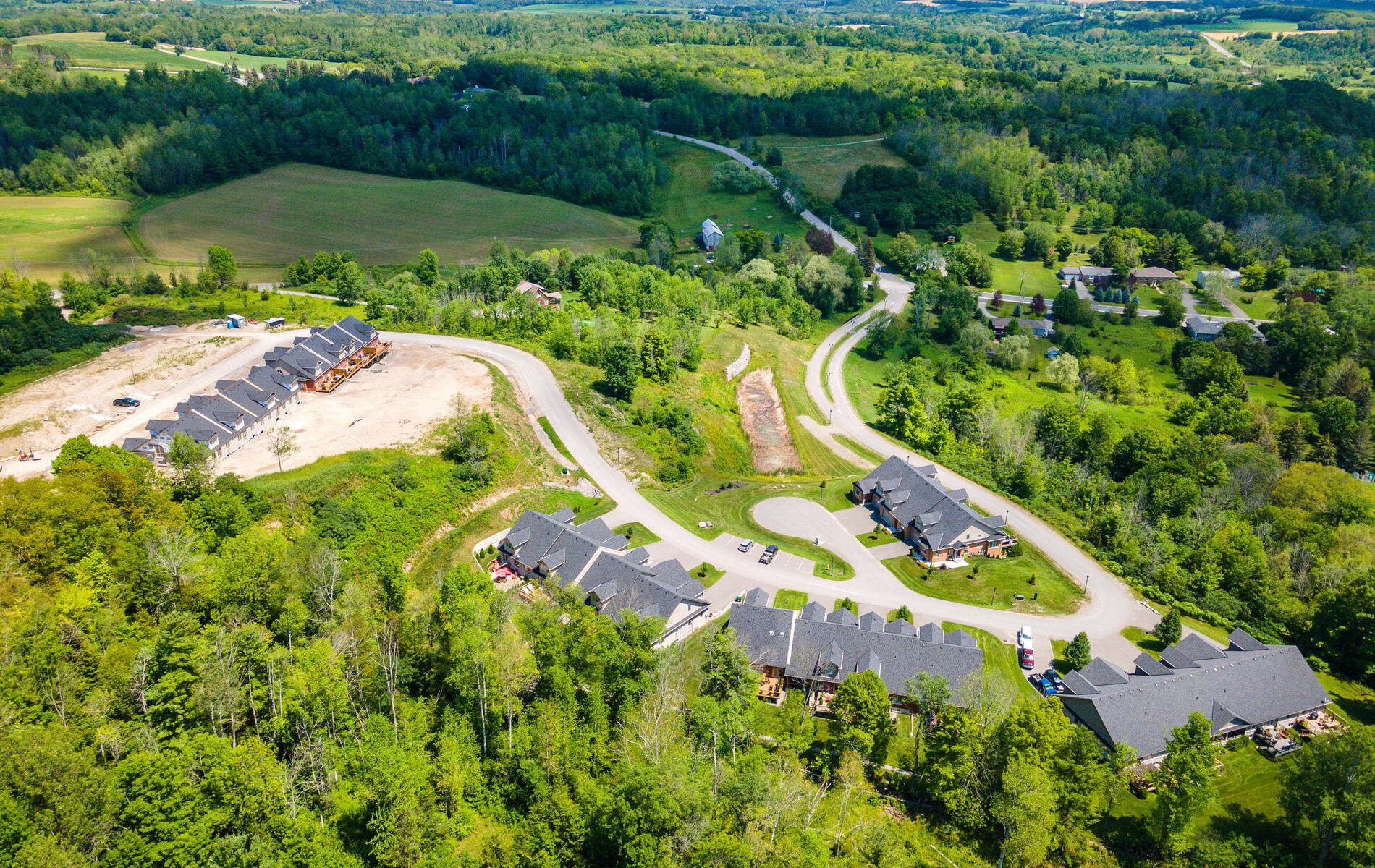 Aerial view of Orchard Hill, showing finished homes and the current phase under construction